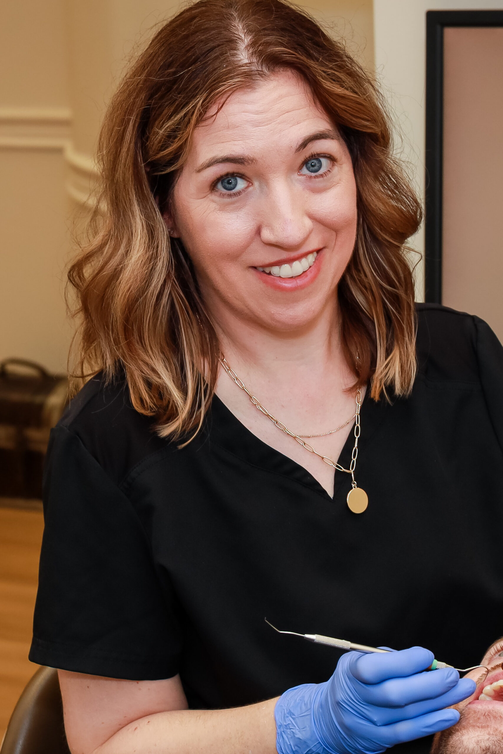 Dr. Dewell chairside at Dental Oasis